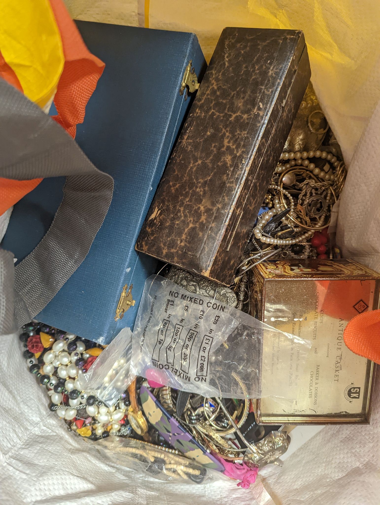 Three large bags of vintage costume jewellery.